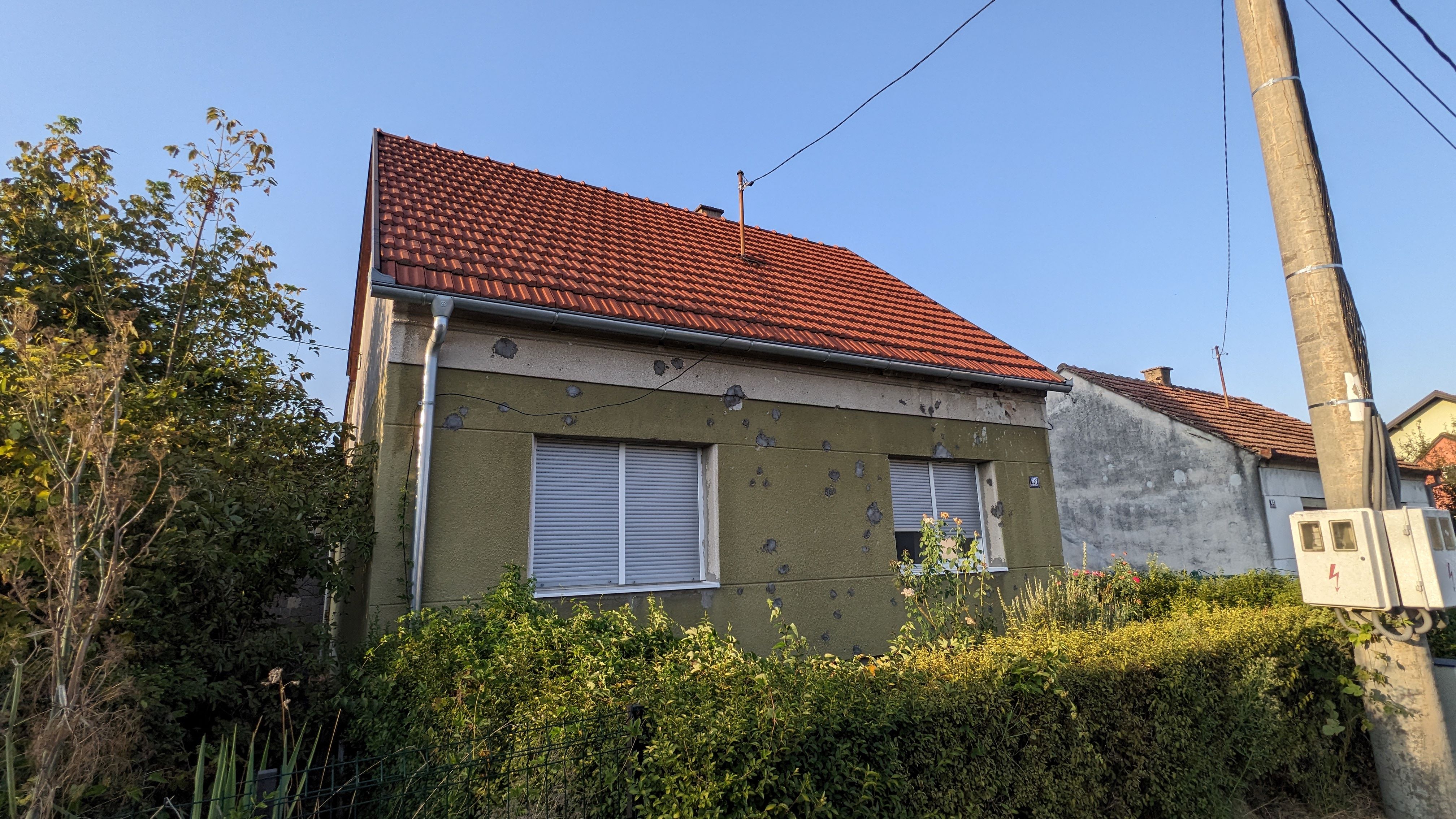 Inhabited house with shrapnel